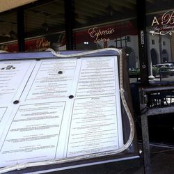 This Monday, June 3, 2013 photo shows Amy's Baking Company in Scottsdale, Ariz., with the menu displayed outside the restaurant. The restaurant temporarily closed after their “Kitchen Nightmares” episode aired.  The episode of “Kitchen Nightmares” drew more than a million viewers on YouTube, and restaurateur Amy Bouzaglo's vitriolic rants became popular fodder on Twitter and Facebook. Bouzaglo announced she is shopping around her own reality TV show. 
