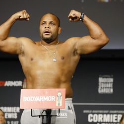 Daniel Cormier poses at UFC 230 weigh-ins.