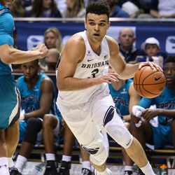 Brigham Young Cougars guard Elijah Bryant (3) drives to the hoop past Coastal Carolina Chanticleers guard Colton Ray-St Cyr (45) during a game at the Marriott Center in Provo on Saturday, Nov. 19, 2016.