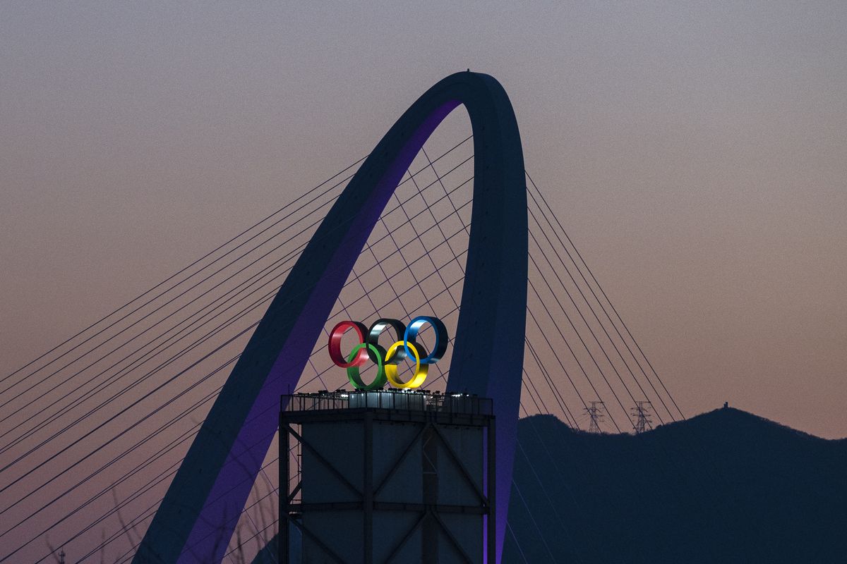 The Olympic Rings are seen on a rooftop at sunset at the Beijing 2022 Winter Olympics Torch Relay at Shougang Park, which will host freestyle skiing, on February 2, 2022 in Beijing, China. The games are set to open on February 4th.