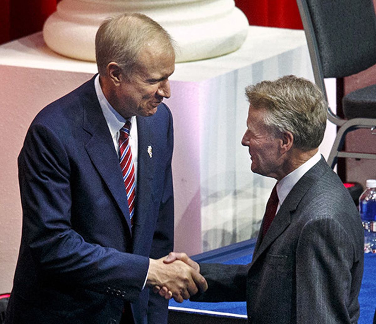 Illinois Gov. Bruce Rauner (left) shakes hands with Illinois House Speaker Michael Madigan after inauguration ceremonies in Springfield on Jan. 12, 2015. | Ted Schurter/The State Journal-Register via AP