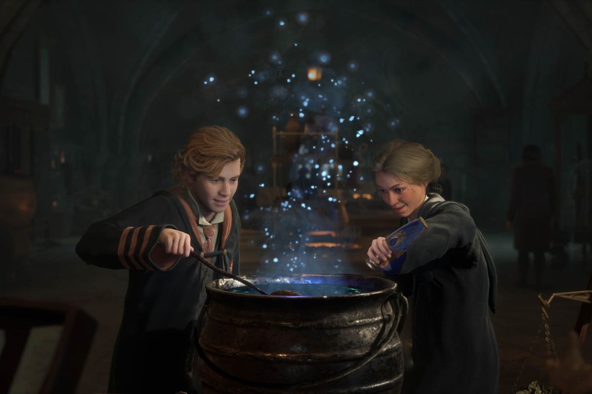 Two smiling Hogwarts students mix a potion recipe in a cauldron in a screenshot from Hogwarts Legacy