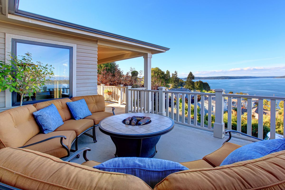 Patio area of a Tacoma, Washington, home with a view of the Puget Sound
