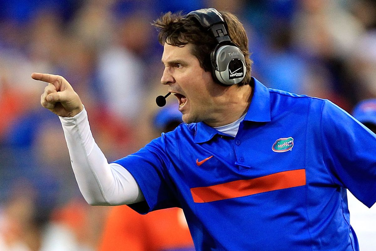 JACKSONVILLE, FL - OCTOBER 29:  Head coach Will Muschamp of the Florida Gators points during the game against the Georgia Bulldogs  at EverBank Field on October 29, 2011 in Jacksonville, Florida.  (Photo by Sam Greenwood/Getty Images)