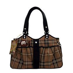 <b>Uber's Pick:</b> Pet Flys Monkey Bon-Ami dog tote, <a href="http://www.petflys.com/citygirl.html#bonami">$130</a> (online); available in-store at Tailwaggers Hollywood. "I have three carriers for my Pomerian—<i>love</i> them [and the other styles