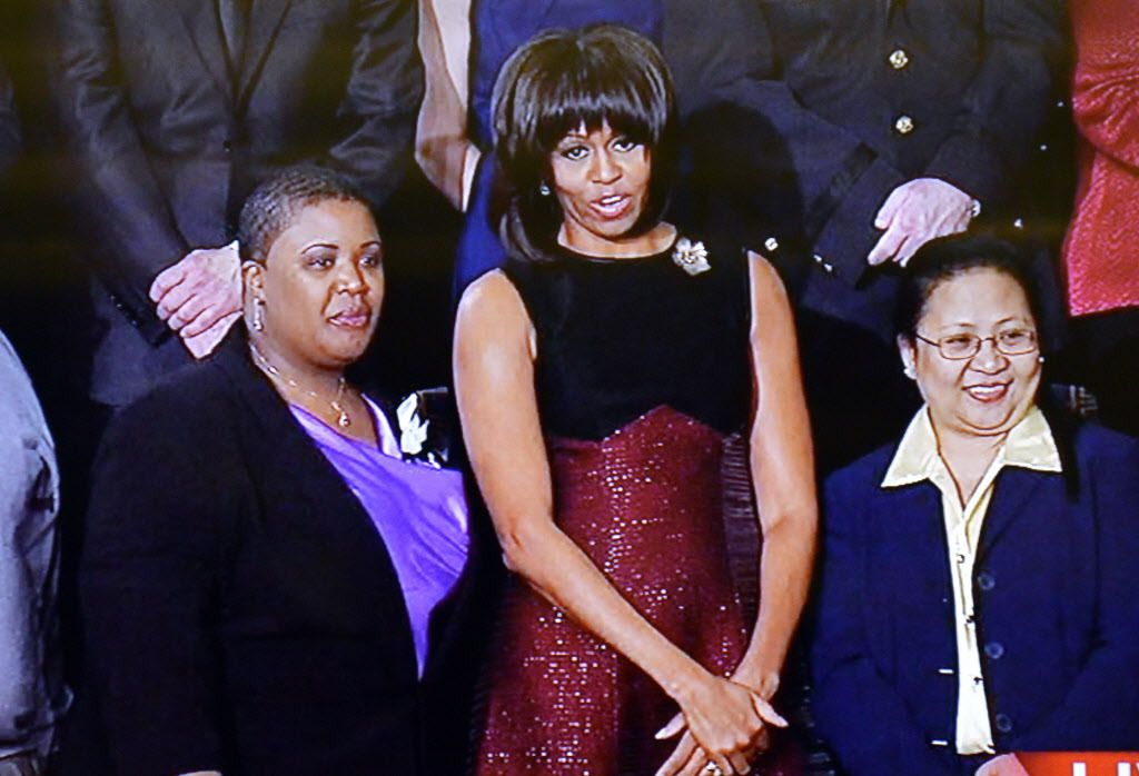 Cleopatra Cowley-Pendleton (left) mother of teenage shooting victim Hadiya Pendleton, with Michelle Obama in the joint congressional box of the U.S. House of Representatives before the 2013 State of the Union address. | ABC Network News