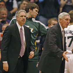 Coach Jerry Sloan, center, and assistant coach Phil Johnson during a timeout as the Utah Jazz are defeated by the Chicago Bulls 91-86 as they play NBA basketball Wednesday, Feb. 9, 2011, in Salt Lake City, Utah. Reportedly both have resigned from the Utah Jazz.