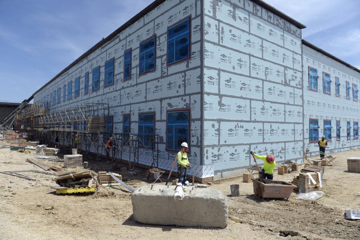 Construction crews work on Riverdale Ridge High School in Thornton, the newest in the Brighton 27J School District in May 2017.