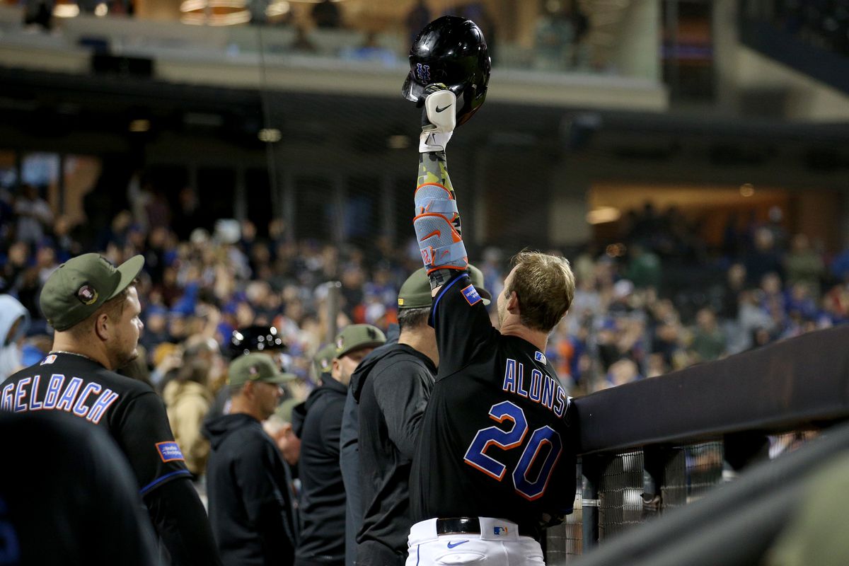 New York Mets first baseman Pete Alonso acknowledges the fans after hitting a game tying grand slam home run against the Cleveland Guardians during the seventh inning at Citi Field.