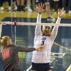 BYU setter Alohi Robins-Hardy blocks a kill attempt by UNLV outside hitter Caitlin Wernentin during an NCAA volleyball playoff game in Provo on Saturday, Dec. 3, 2016. BYU swept UNLV 3-0 to advance to the Sweet 16.