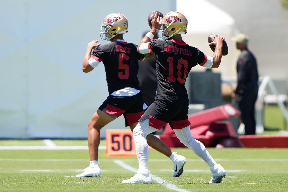 49ers QBs Jimmy Garoppolo and Trey Lance throw during OTAs