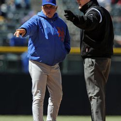 New York Mets manager Terry Collins, left, argues a call at second with umpire Mike DiMuro during the sixth inning of a baseball game against the Colorado Rockies, Thursday, April 18, 2013, in Denver. 