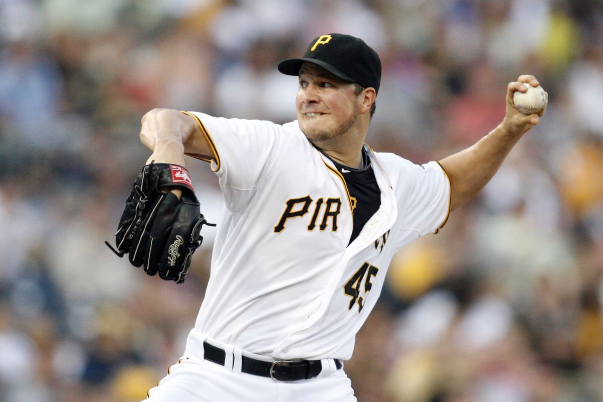 July 23, 2012; Pittsburgh, PA, USA; Pittsburgh Pirates starting pitcher Erik Bedard (45) pitches against the Chicago Cubs during the third inning at PNC Park. Mandatory Credit: Charles LeClaire-US PRESSWIRE