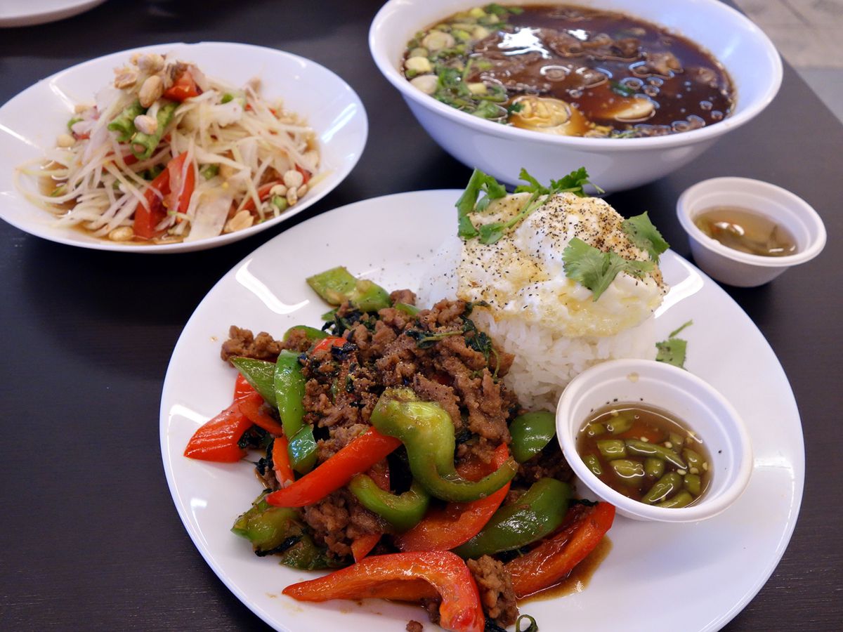A&nbsp;trio of dishes at Vientiane Grocery.