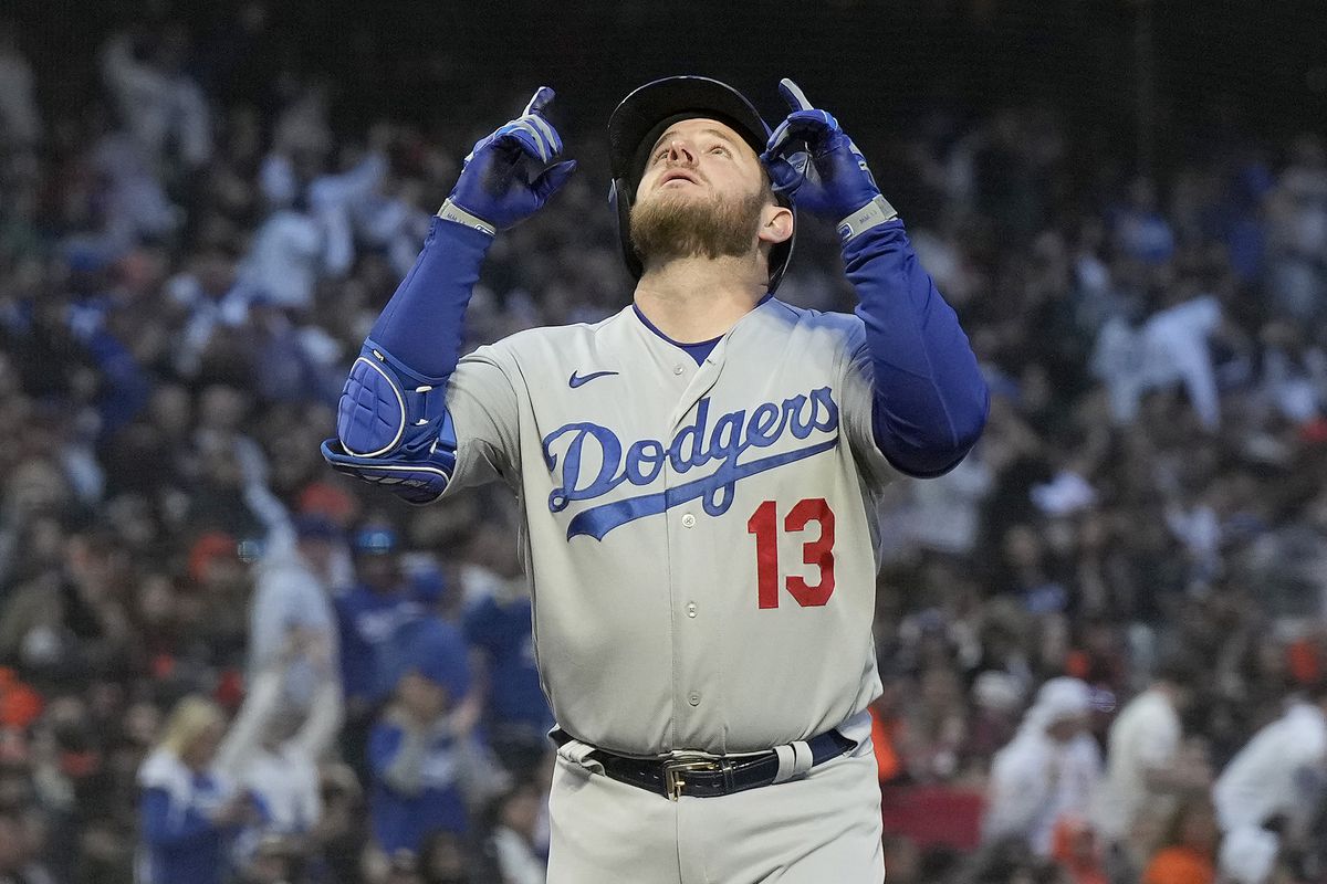 Max Muncy pointing at the sky after a home run