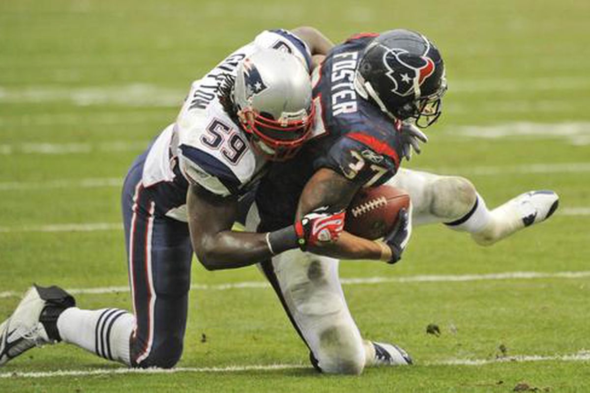 <em>LB Gary Guyton is young, fast, improving and a keeper, shown here bringing down Texans RB Arian Foster</em>.