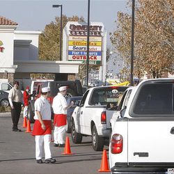 The Orem IN-N-OUT Burger restaurant opened at 9 a.m. Thursday and had plenty of staff on hand to handle the cars that started to line up after opening. 