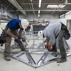 Students learn to make metal rafters. | Ashlee Rezin/Sun-Times
