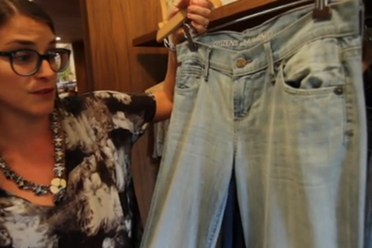 Bird owner Jen Mankins points out a pair of Current/Elliott jeans from the Warehouse Sale