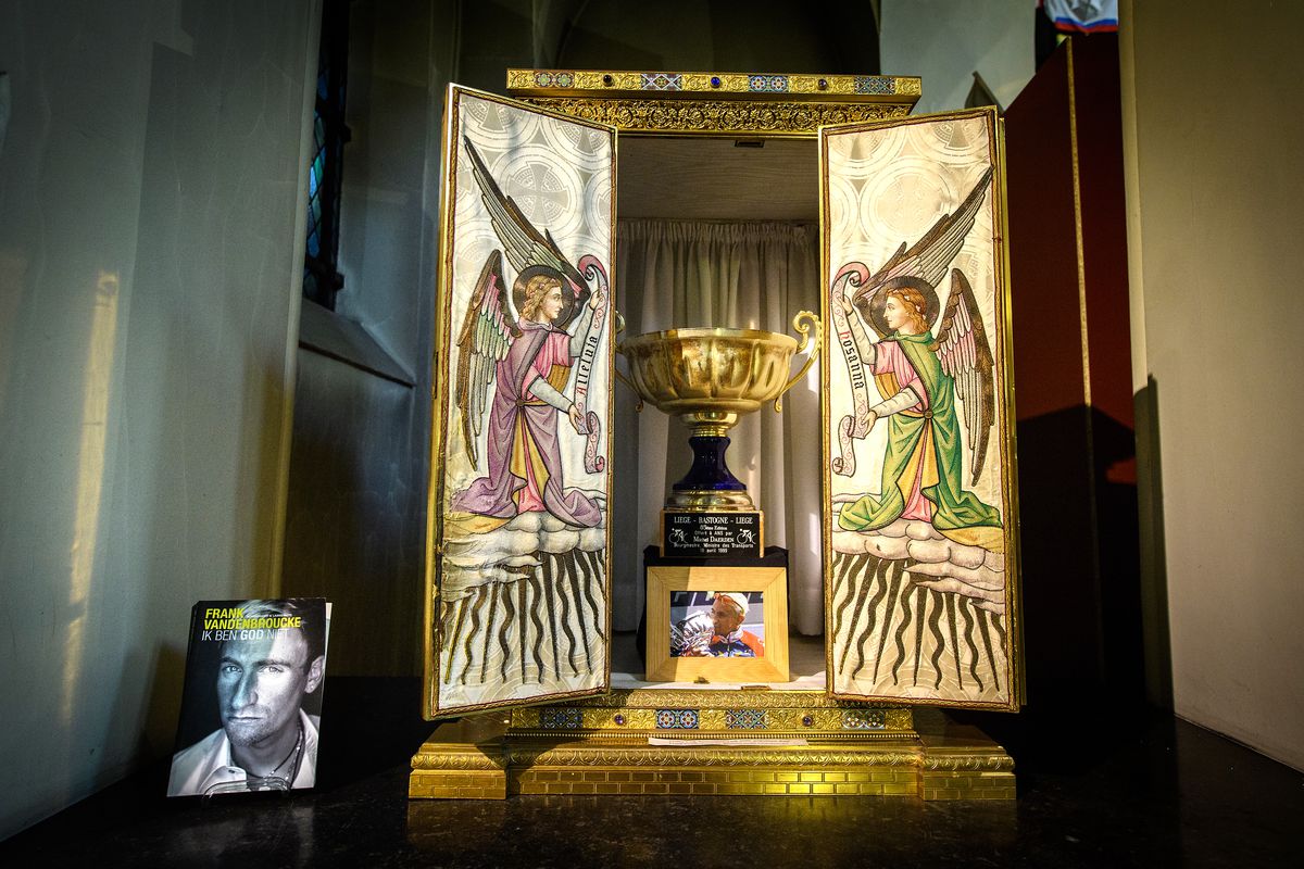 The trophy Frank Vanbdenbroucke took home after winning the 1999 Liège-Bastogne-Liège, displayed as if it were a religious icon as part of the Cycling Museum Roeselare’s ‘Cycling is a Religion’ exhibition