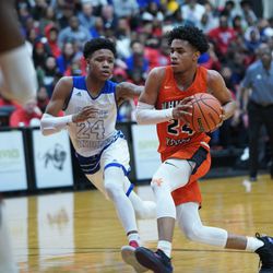 Young’s Tyler Beard (24) blows past Curie’s Ramean Hinton (23), Friday 03-08-19. Worsom Robinson/For the Sun-Times.