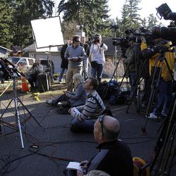 Detective Ed Troyer of the Pierce County Sheriff's Department talks with the press near the home of Josh Powell in Graham, Wash., Monday, Feb. 6, 2012.
