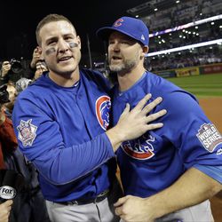 Chicago Cubs' Anthony Rizzo and David Ross celebrate after Game 7 of the Major League Baseball World Series against the Cleveland Indians Thursday, Nov. 3, 2016, in Cleveland. The Cubs won 8-7 in 10 innings to win the series 4-3. 