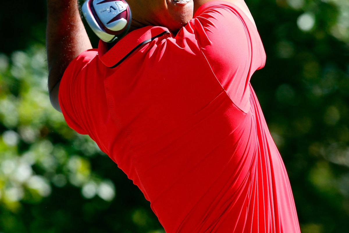 NORTON, MA - SEPTEMBER 03:  Tiger Woods tees off on the fourth hole during the final round of the Deutsche Bank Championship at TPC Boston on September 3, 2012 in Norton, Massachusetts.  (Photo by Jim Rogash/Getty Images)