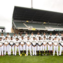 The Salt Lake Bees players and coaches stand for a team photo as they hold their media day at Smith's Ballpark on Tuesday, April 2, 2019.