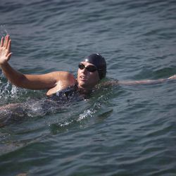 Australian swimmer Chloe McCardel waves to spectators as she begins her swim to Florida from the waters off Havana, Cuba, Wednesday, June 12, 2013. McCardel, 29, is bidding to become the first person to make the Straits of Florida crossing without the protection of a shark cage. American Diana Nyad and Australian Penny Palfrey have attempted the crossing four times between them since 2011, but each time threw in the towel part way through due to injury, jellyfish stings or strong currents. Australian Susie Maroney did it in 1997, but with a shark cage. 