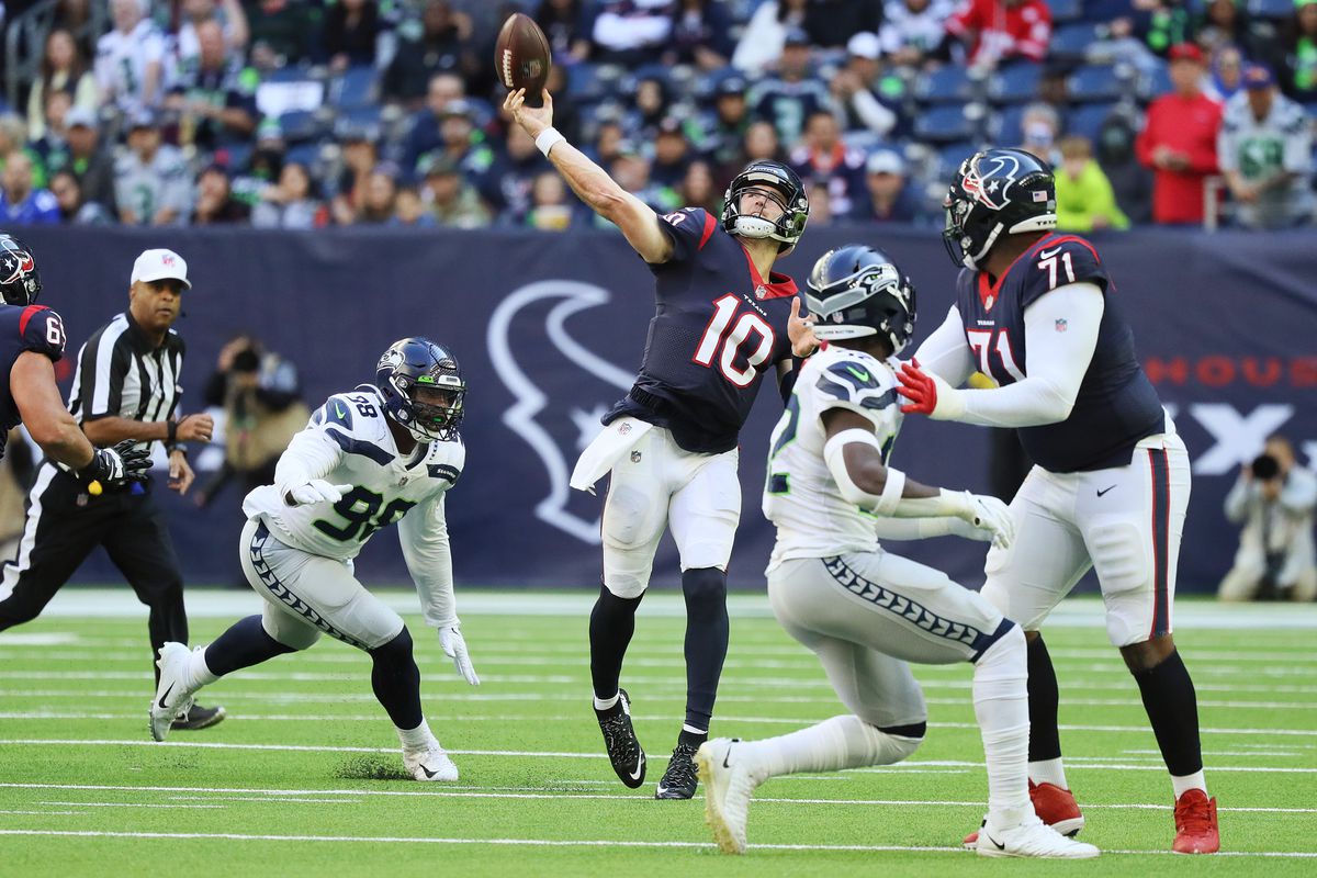 Davis Mills #10 of the Houston Texans throws the ball during the fourth quarter against the Seattle Seahawks at NRG Stadium on December 12, 2021 in Houston, Texas.