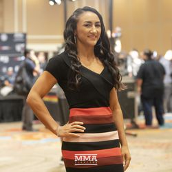 Carla Esparza poses at UFC 228 media day.