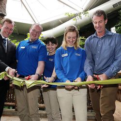 Dignitaries cut a ribbon as Tracy Aviary unveils its new “Treasures of the Rainforest” exhibit in Salt Lake City on Wednesday, March 30, 2016.
