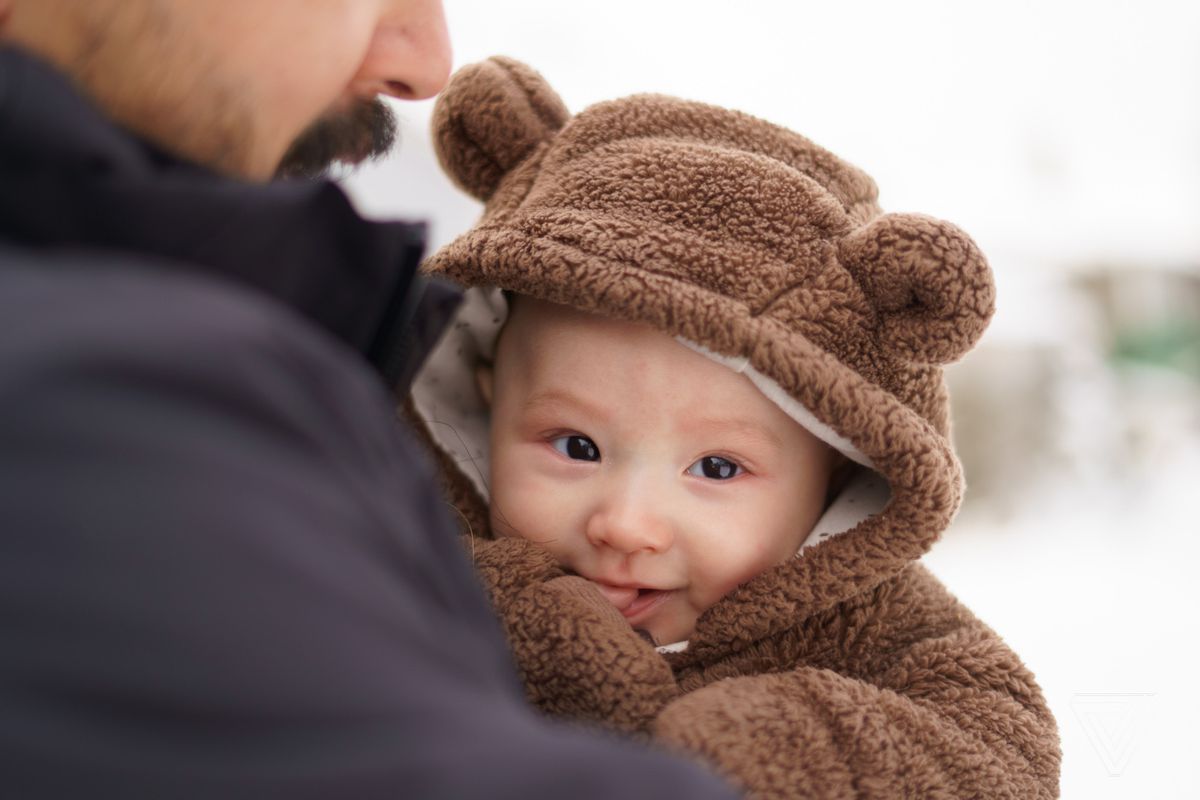 Cute baby in bear outfit