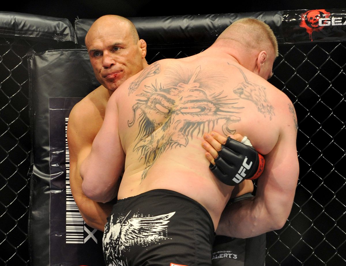 Randy Couture clinches with Brock Lesnar at UFC 91.