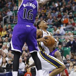 Utah Jazz point guard Trey Burke (3) drives on Sacramento Kings shooting guard Ben McLemore (16) during NBA action in Salt Lake City Saturday, Dec. 7, 2013. The Kings won 112-102.