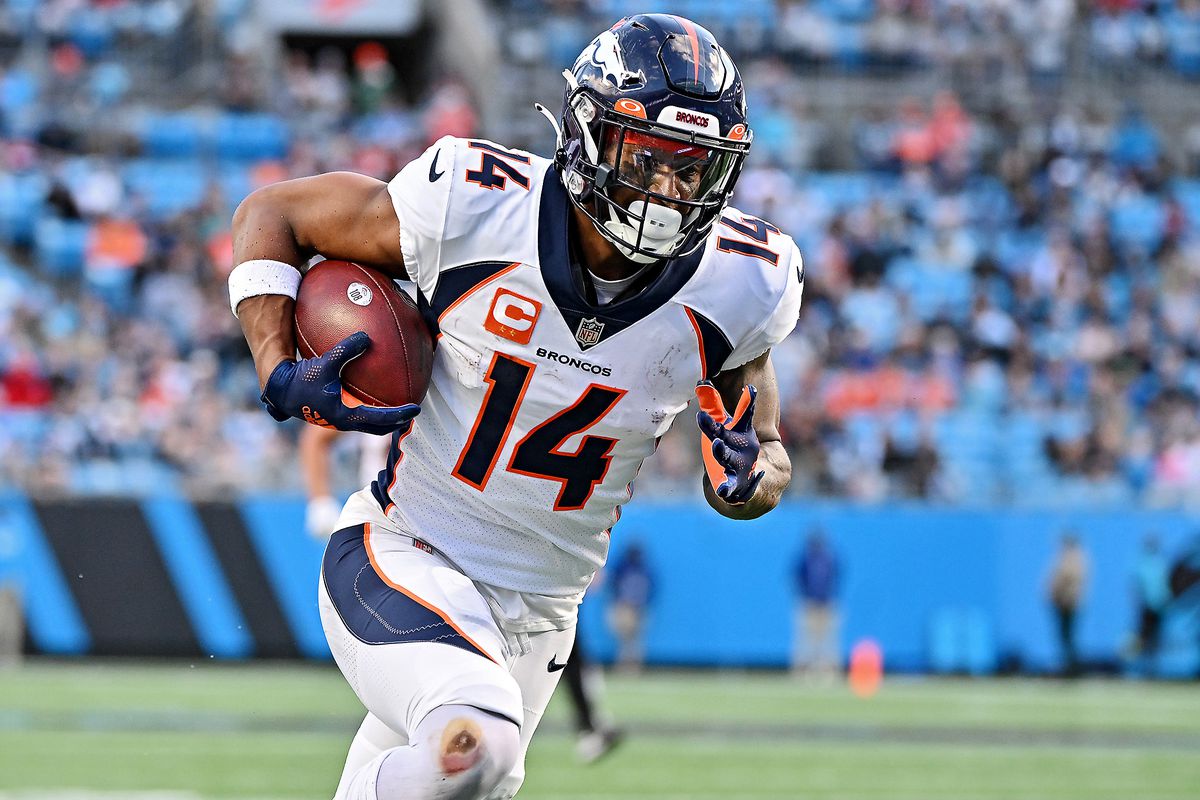 Courtland Sutton #14 of the Denver Broncos runs with the ball during the second half at Bank of America Stadium on November 27, 2022 in Charlotte, North Carolina.