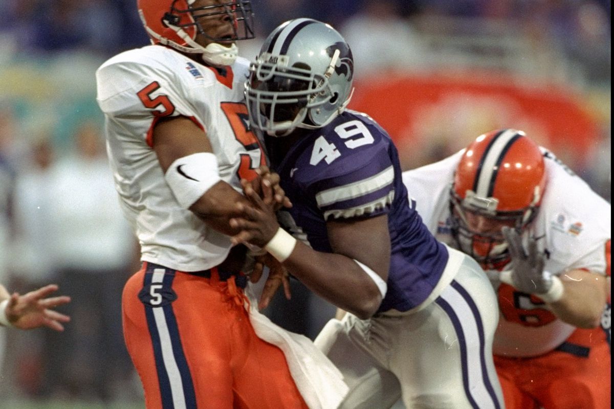 I couldn't find any pictures of a K-State running back wearing No. 49, so here's a delightful throwback picture of Darren Howard sacking Donovan McNabb instead. Made your day, didn't it?