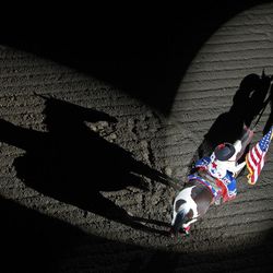 A cowgirl holding the American flag opens the Days of ’47 rodeo on Monday, July 18, 2011, in West Valley City, Utah.  
