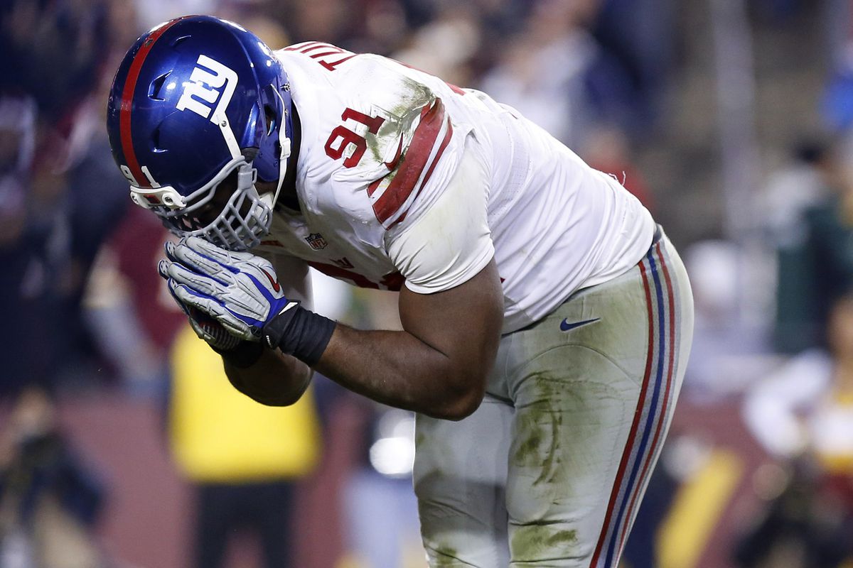 Justin Tuck takes a bow after one of his four sacks Sunday