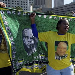 African National Congress (ANC) protesters in support of President Jacob Zuma march to parliament in Cape Town, South Africa, Tuesday Aug. 8, 2017. South Africa's parliament prepared to vote Tuesday on a motion of no confidence in embattled South African President Jacob Zuma that could force him to resign after months of growing anger over alleged corruption. (AP Photo)