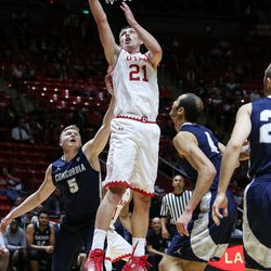 Utah Utes forward Tyler Rawson (21) lays it in during a game against Concordia at the Hunstman Center in Salt Lake City on Tuesday, Nov. 15, 2016.