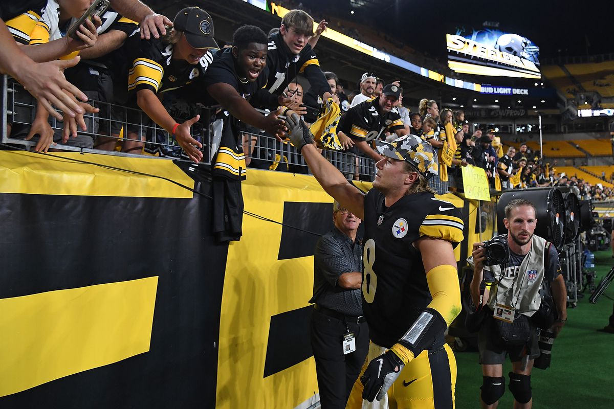 Kenny Pickett #8 of the Pittsburgh Steelers shakes hands with fans following a 32-25 win over the Seattle Seahawks during a preseason game at Acrisure Stadium on August 13, 2022 in Pittsburgh, Pennsylvania.