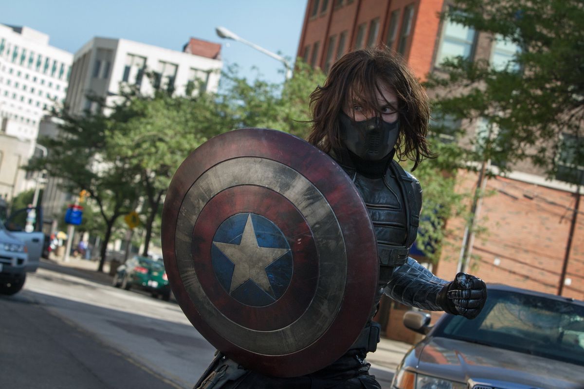 Captain America: The Winter Soldier - the Winter Soldier holding Captain America’s shield
