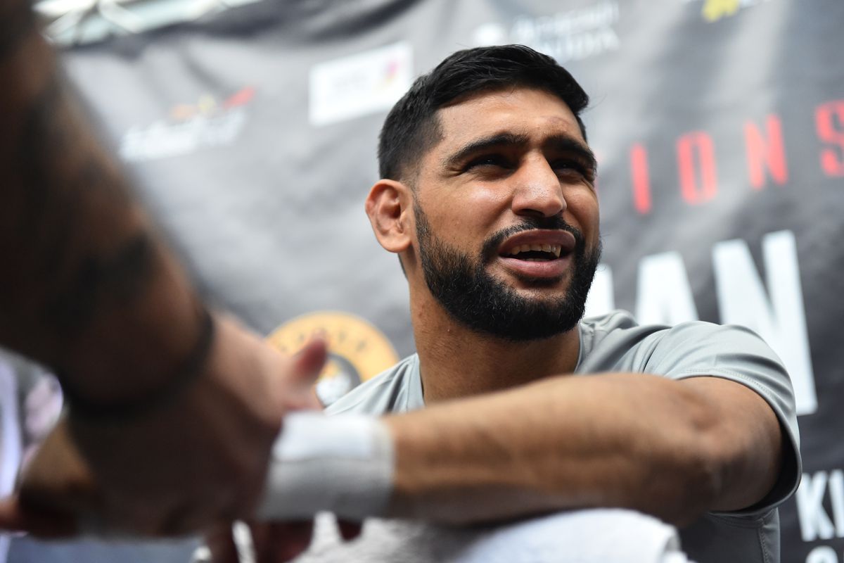 Khan will face his longtime rival on Feb. 19.