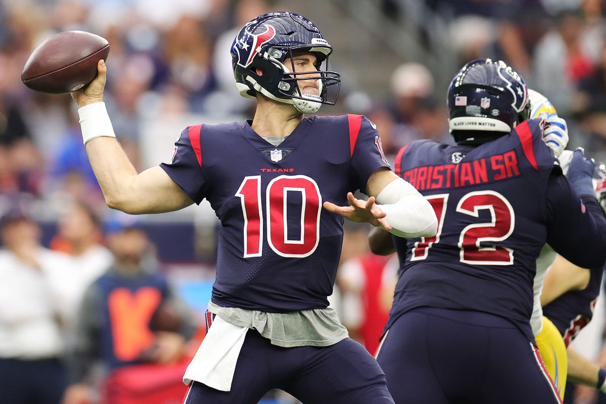 Davis Mills #10 of the Houston Texans throws the ball during the third quarter against the Los Angeles Chargers at NRG Stadium on December 26, 2021 in Houston, Texas.