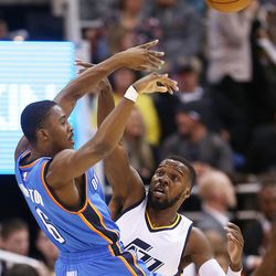 Oklahoma City Thunder guard Semaj Christon (6) passes away from the defense of Utah Jazz guard Shelvin Mack (8) as the Jazz and the Thunder play at Vivint Smart Home arena in Salt Lake City on Wednesday, Dec. 14, 2016.