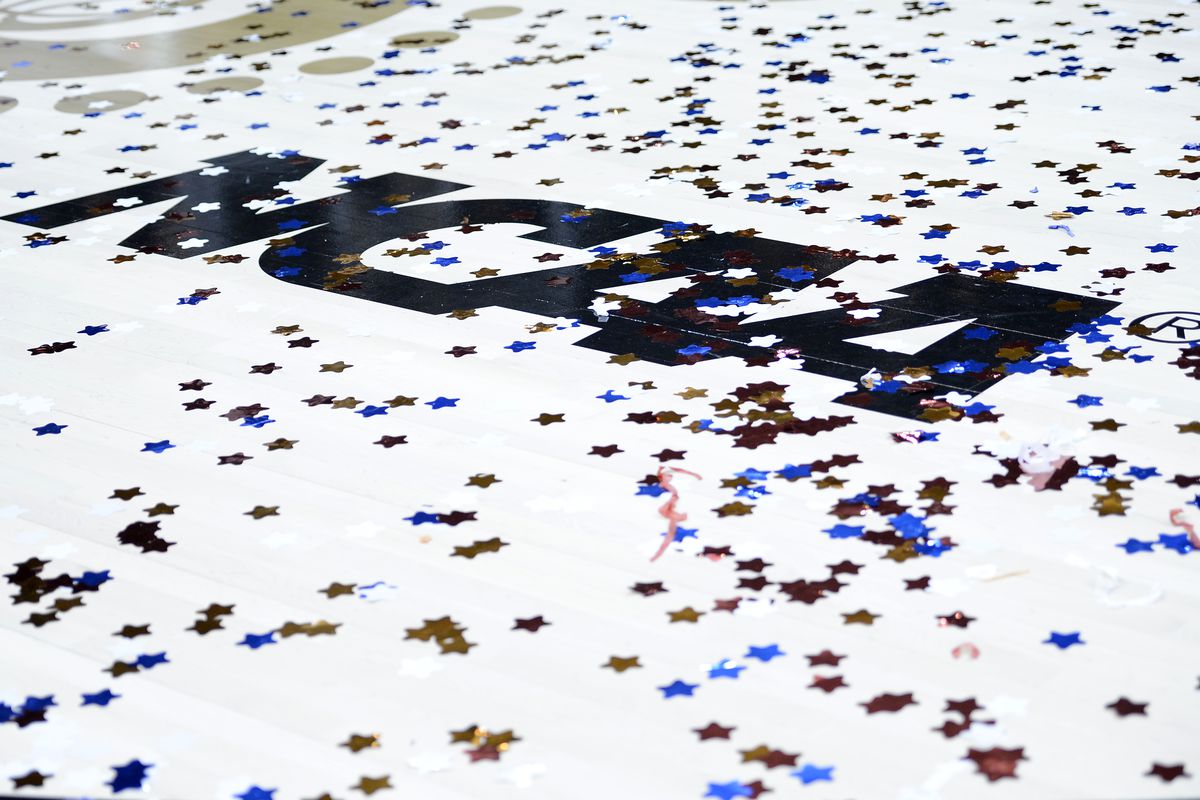 A detailed view of an NCAA logo and confetti after the championship game of the 2013 NCAA Womens Final Four at New Orleans Arena on April 9, 2013 in New Orleans, Louisiana.