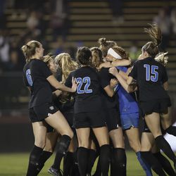 BYU celebrates after beating Santa Clara 3-2 in a penalty kick shootout during the NCAA women’s soccer tournament semifinals at Stevens Stadium in Santa Clara, Calif., on Friday, Dec. 3, 2021. The Cougars advanced to the national championship game, where they’ll face Florida State.