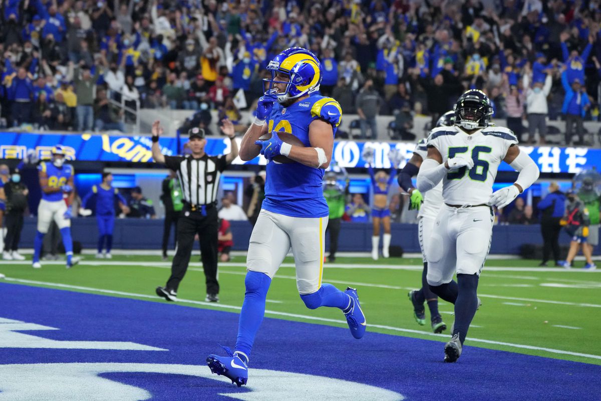 Los Angeles Rams wide receiver Cooper Kupp (10) celebrates after scoring on a 29-yard touchdown reception against the Seattle Seahawks in the second half at SoFi Stadium